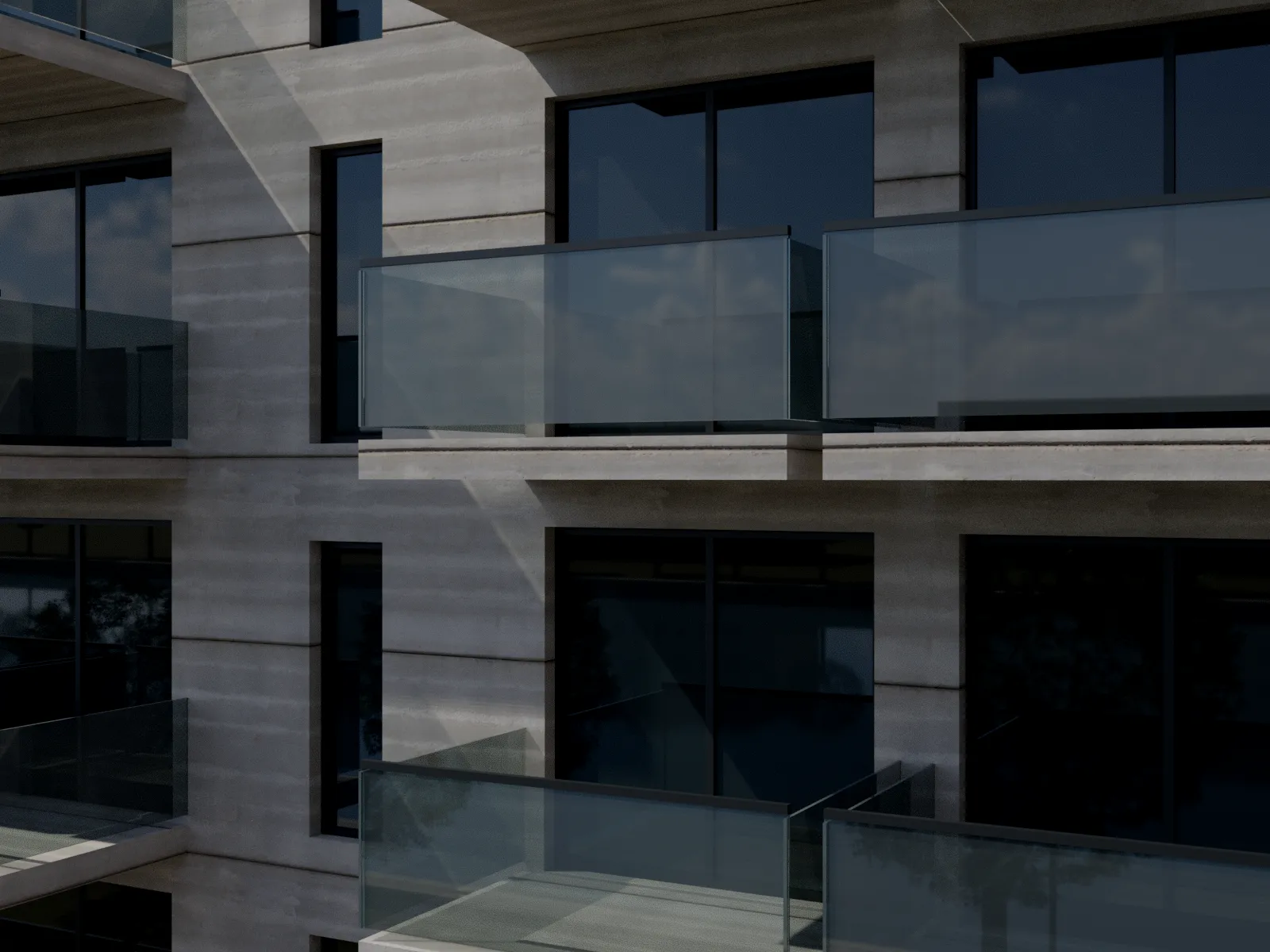 Detal: beton architektoniczny i szklane balustrady